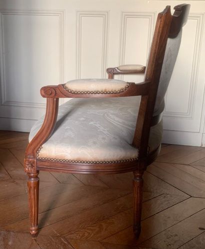 Molded stained wood sofa, the back in gendarme...