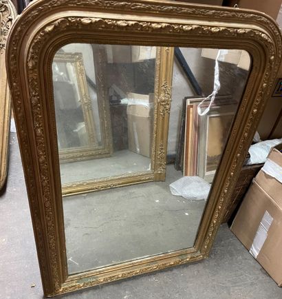 Two wood and gilded stucco mantel mirrors...