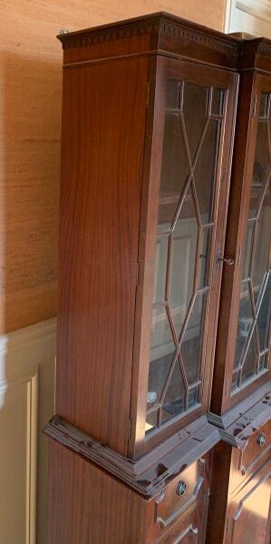 Mahogany bookcase, the upper part glazed,...