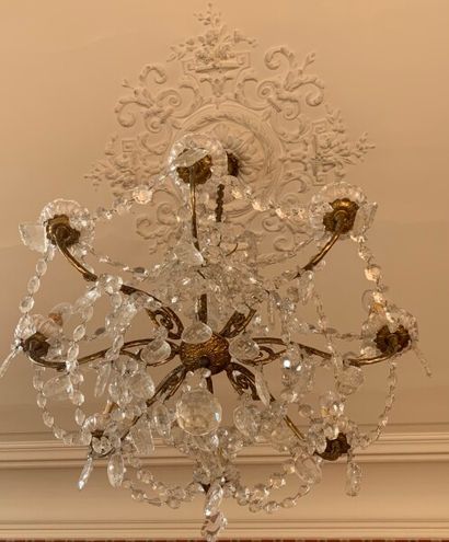 An ormolu chandelier with eight arms of light...