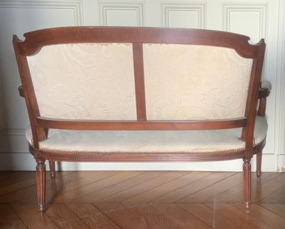 Molded stained wood sofa, the back in gendarme...