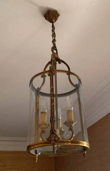 Brass cylindrical lantern.

Louis XVI style.

Approximately...