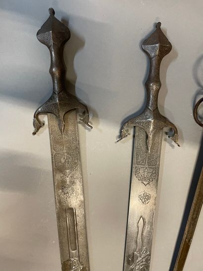 Set of four swords with chased decoration

Length...