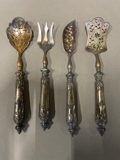 Candy set, the handle in silver chased with...