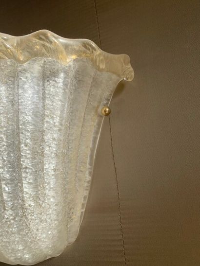 Two moulded frosted glass sconces with gold...