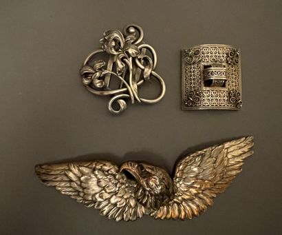 
Three metal belt buckles 









Amber...