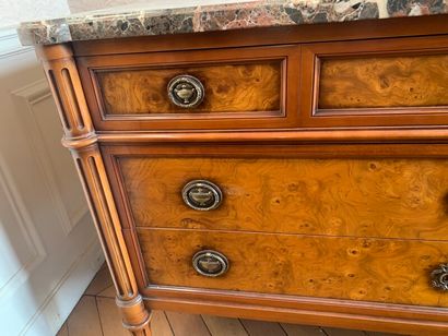 A burl veneer chest of drawers opening with...