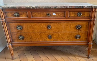 A burl veneer chest of drawers opening with...