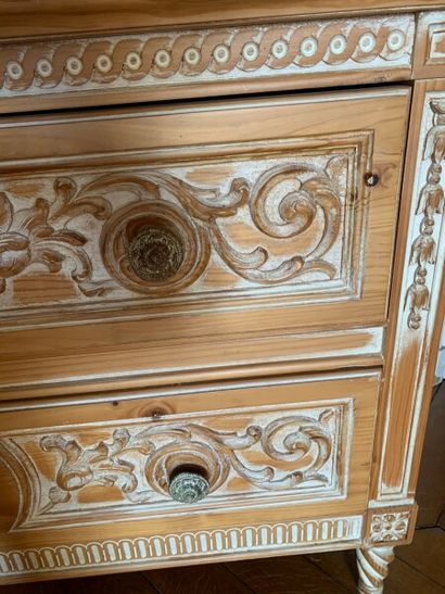 A two drawer chest of drawers, made of partially...
