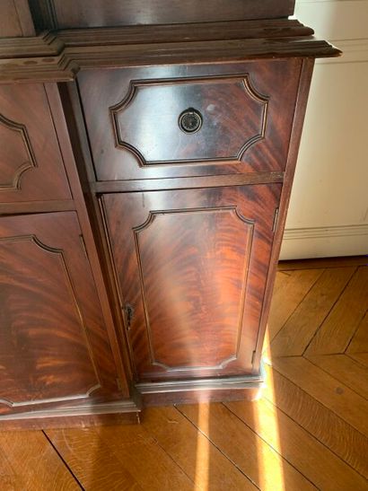Mahogany bookcase, the upper part glazed,...