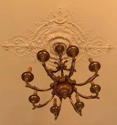 A gilt bronze chandelier with eight arms...