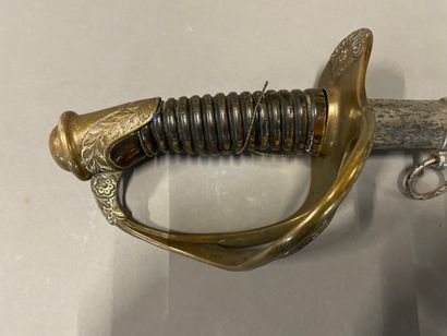 Officer's sword signed on the guard.

Third...