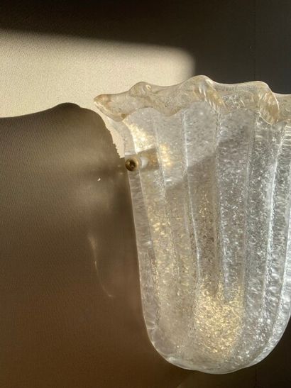 Two moulded frosted glass sconces with gold...