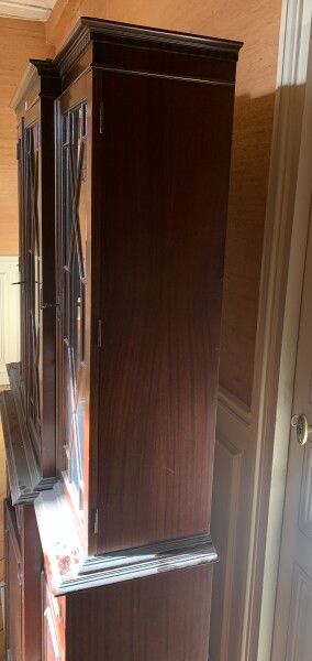 Mahogany bookcase, the upper part glazed,...
