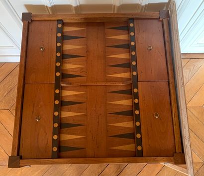 Game table in ceruse wood resting on sheath...