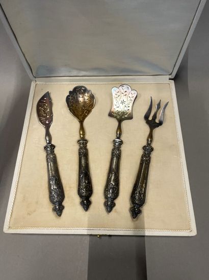 Candy set, the handle in silver chased with...