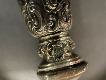 Candy set, the handle in silver chased with...