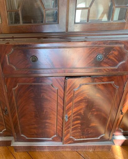 Mahogany bookcase, the upper part glazed,...