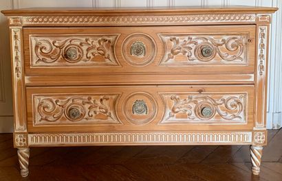 A two drawer chest of drawers, made of partially...