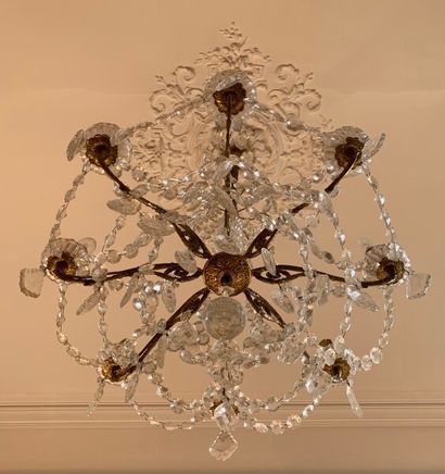 An ormolu chandelier with eight arms of light...