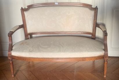 Molded stained wood sofa, the back in gendarme...