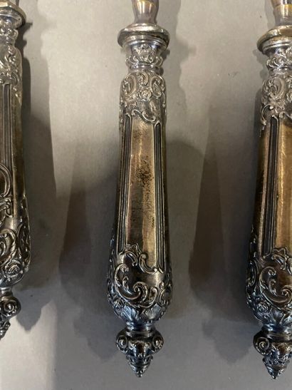 Candy set, the handle in silver chased with...