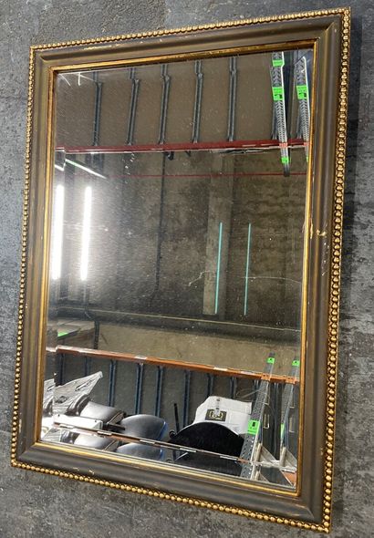 Set of four wood and gilded stucco mirrors

-...