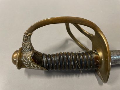 Officer's sword signed on the guard.

Third...