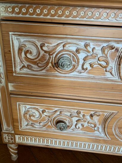 A two drawer chest of drawers, made of partially...