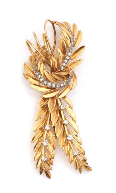Broche feuillages en or jaune et lignes de...