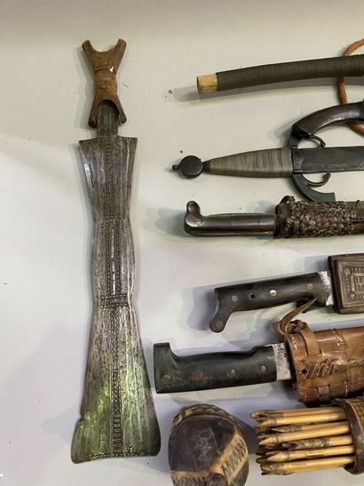 Large lot of swords, daggers, machetes, quivers...