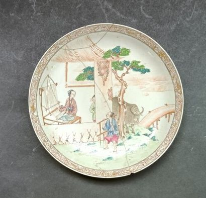Small porcelain plate decorated with a spinner...