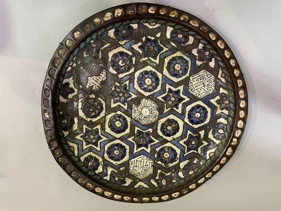 Brass tray with enamelled decoration of rosettes....