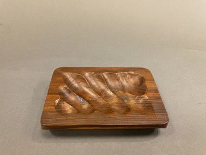 Ashtray in carved guaiac
In the taste of...