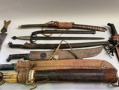 Large lot of swords, daggers, machetes, quivers...