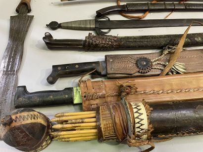 Large lot of swords, daggers, machetes, quivers...