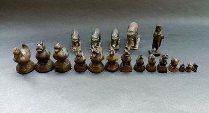 Set of bronze weights with black patina,...