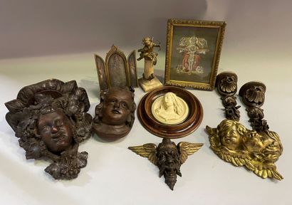 Tête en bois sculpté
Angelot en bronze sur...