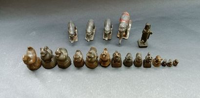 Set of bronze weights with black patina,...