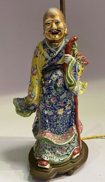 Porcelain sage with polychrome decoration...