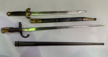 Saber and dagger with leather and brass scabbards
66...