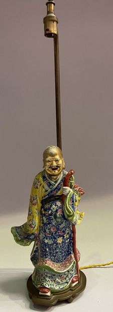 Porcelain sage with polychrome decoration...