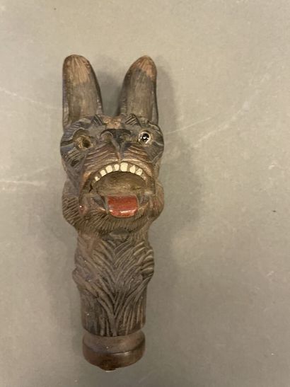 Collection of four cane knobs with dog heads....