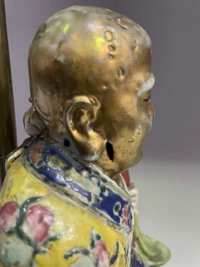 Porcelain sage with polychrome decoration...