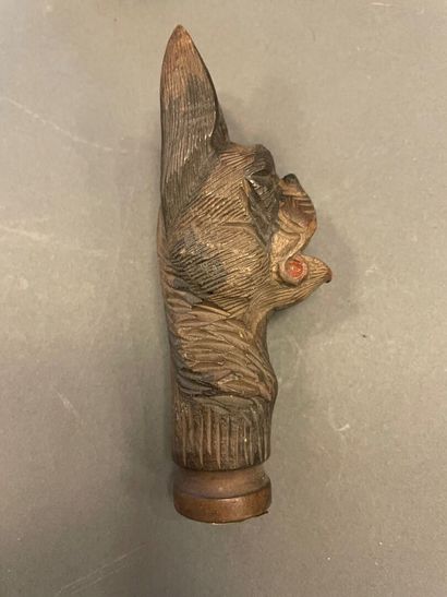 Collection of four cane knobs with dog heads....