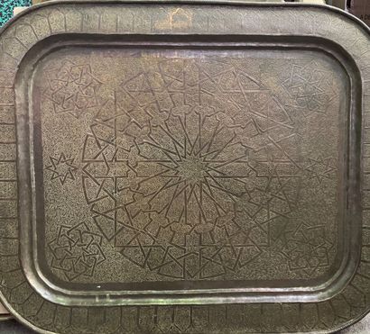 Two trays in chased copper with geometrical...