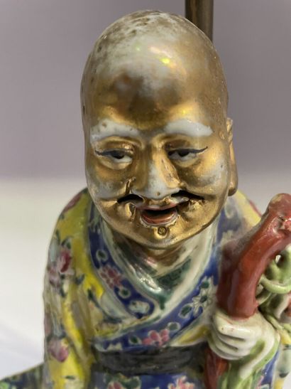 Porcelain sage with polychrome decoration...