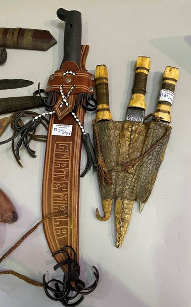 Large lot of swords, daggers, machetes, quivers...