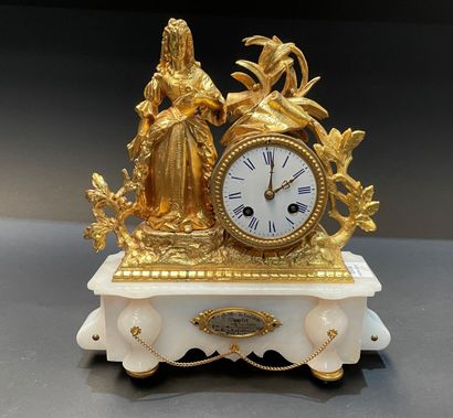 Clock in gilt metal and alabaster with a...
