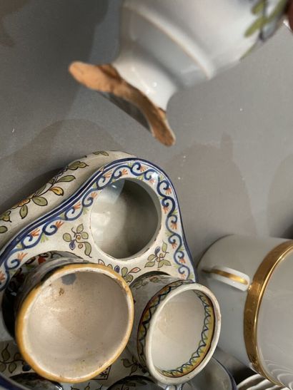 Part of a porcelain dinner service with gilded...